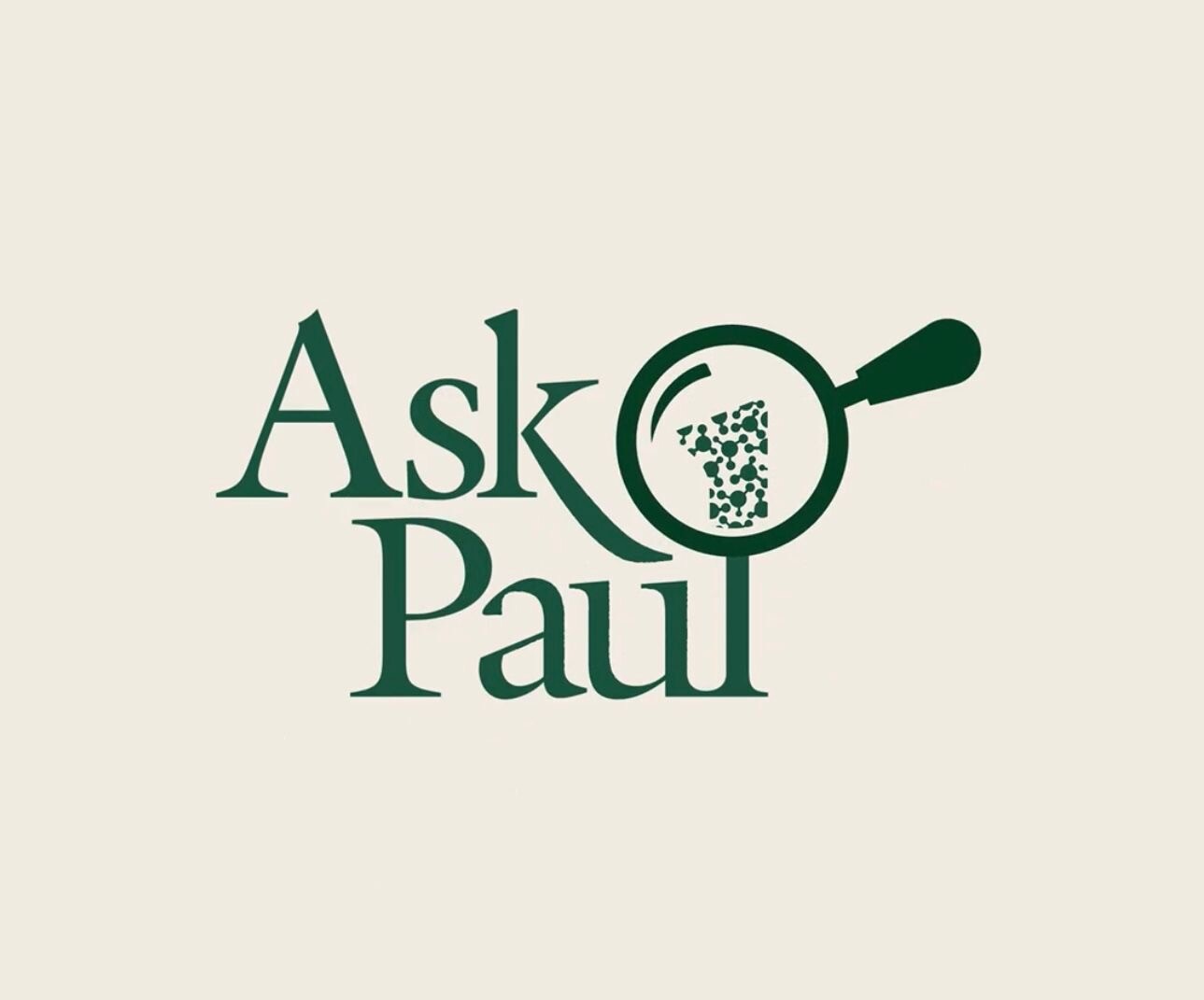 A stylised bit of type that says “Ask Paul”. There is a magnifying glass look at the ascender of the letter L.